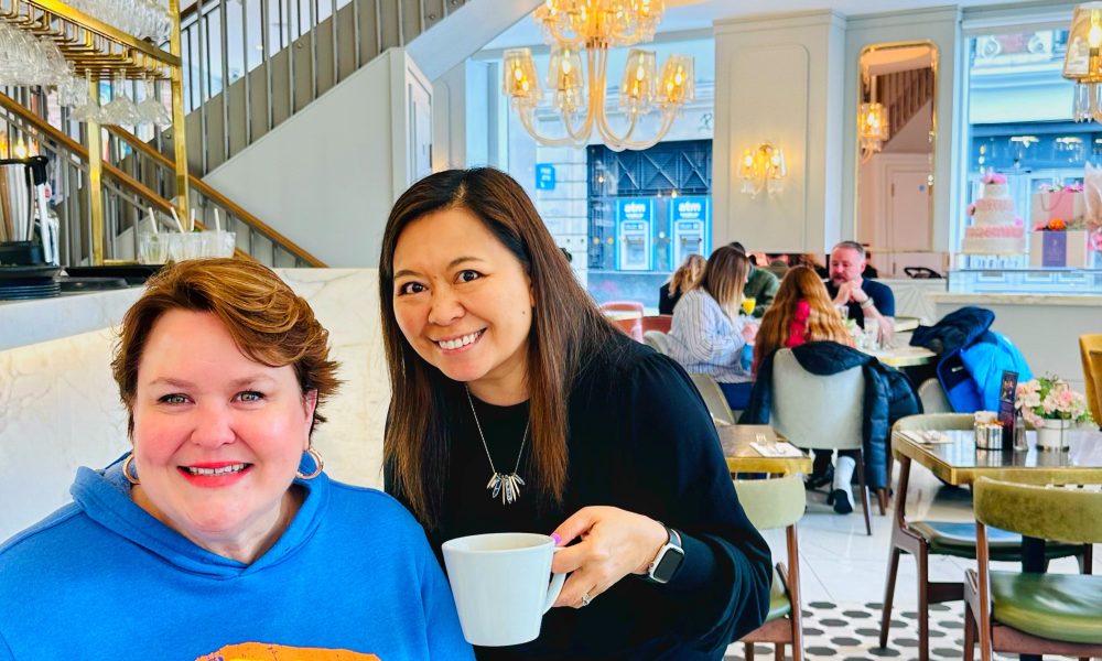 Jen Hendrickson and Marlynn Jayme Schotland having coffee together at Caffe Concerto in London, England.
